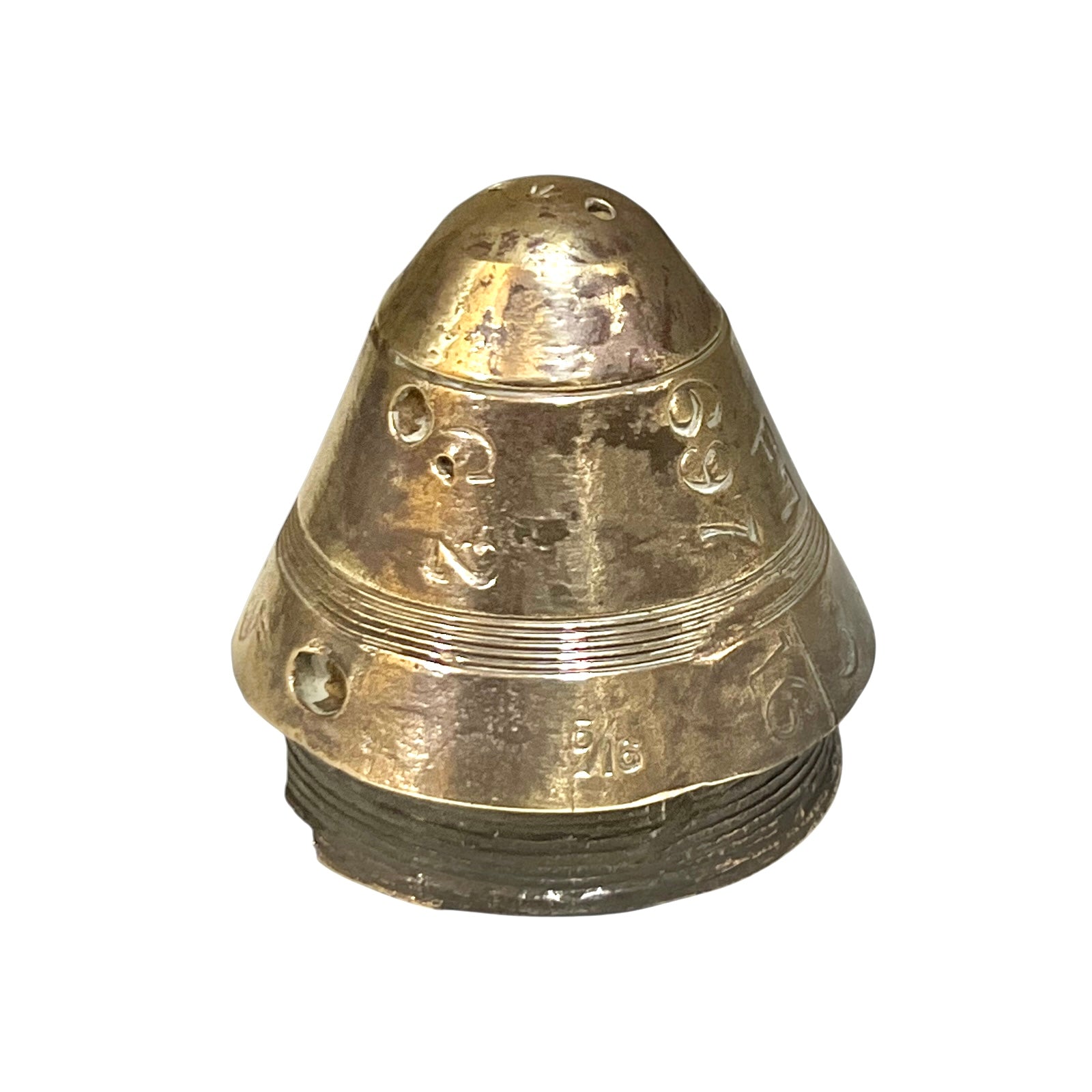 WW1 brass fuse paperweight on a white background