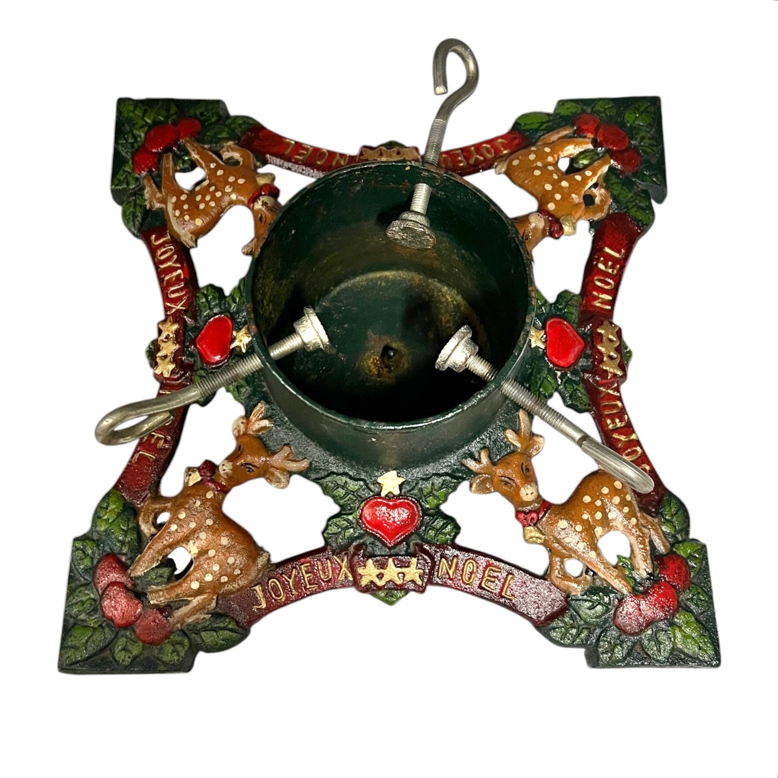Decorative Christmas Tree holder with reindeer, berries, and 'Joyeux Noel' text on a white background