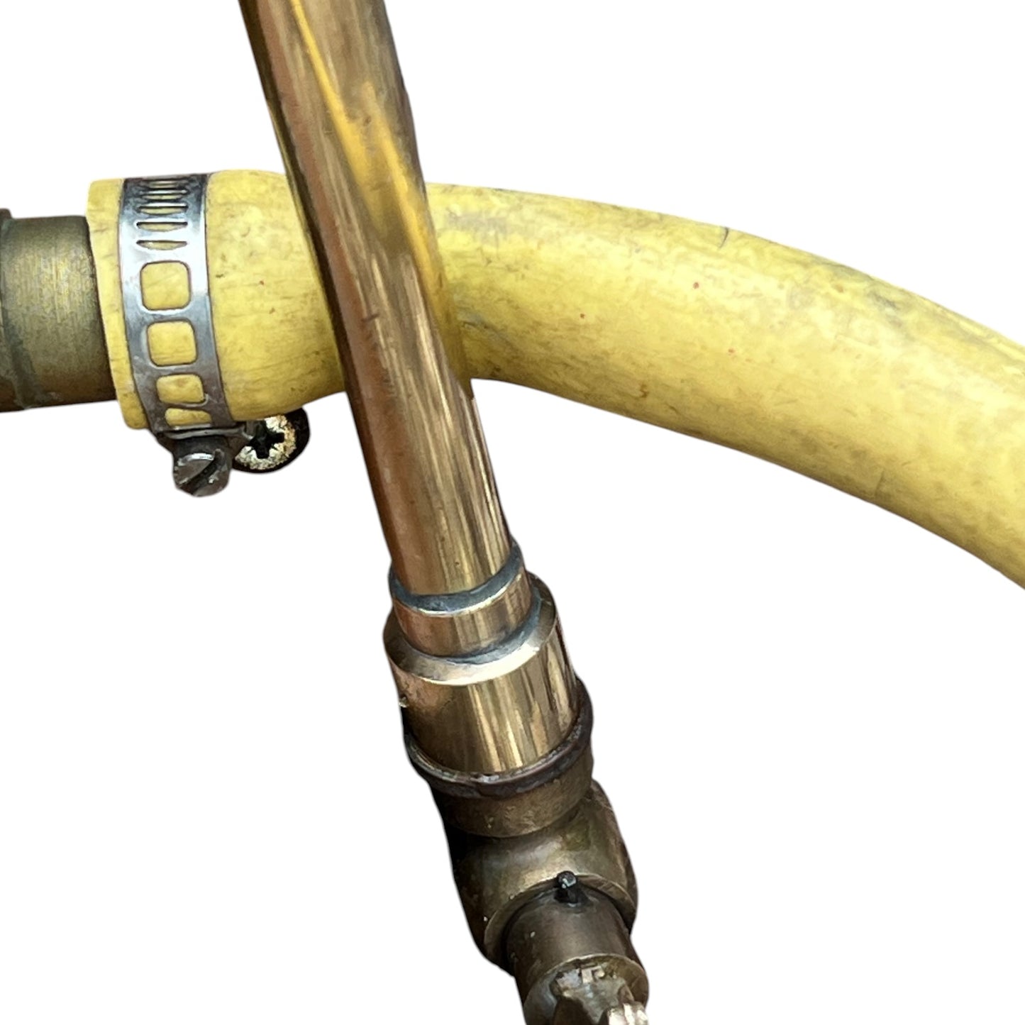 close up of a French copper garden sprayer on a white background 
