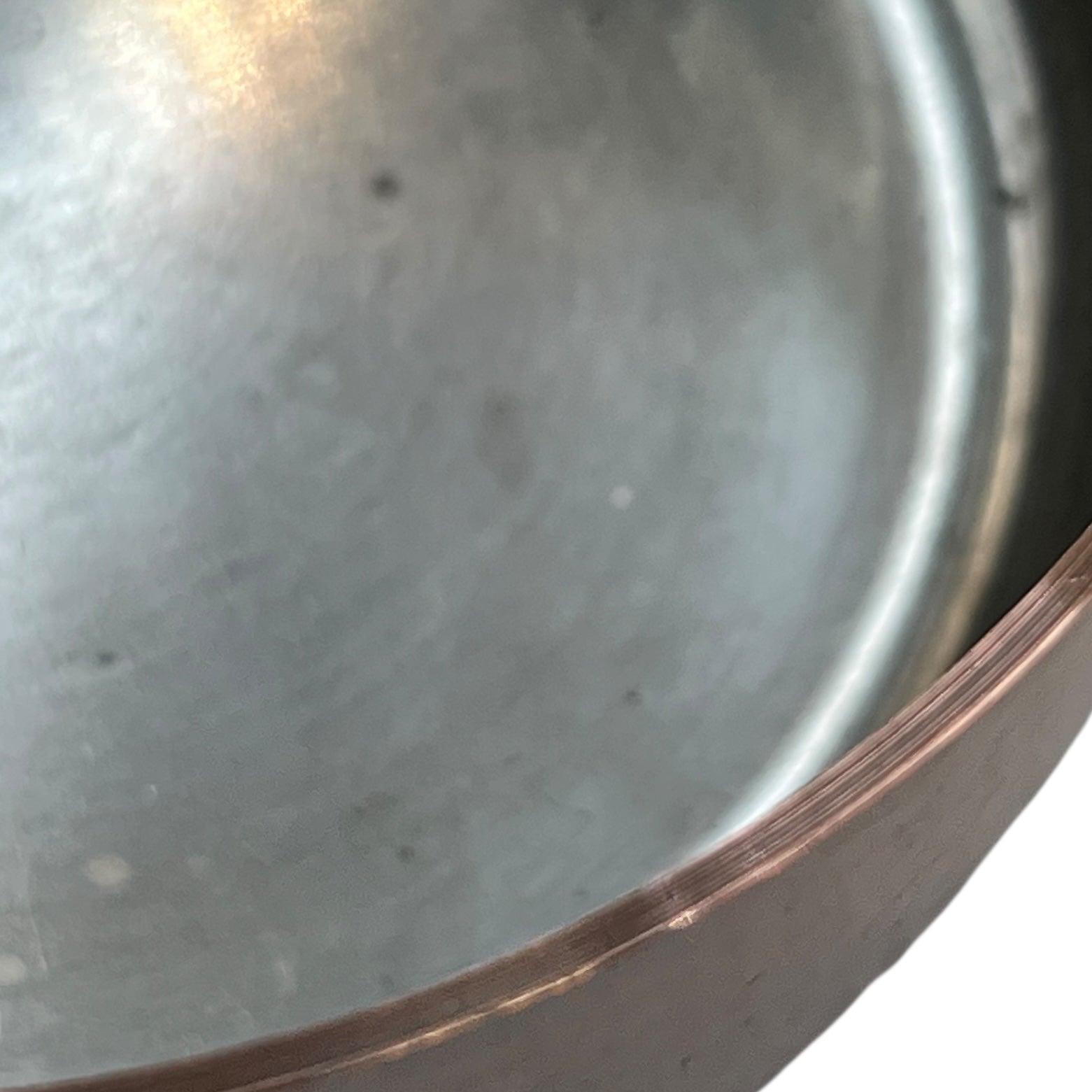 close up of copper pan inner
