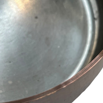 close up of copper pan inner