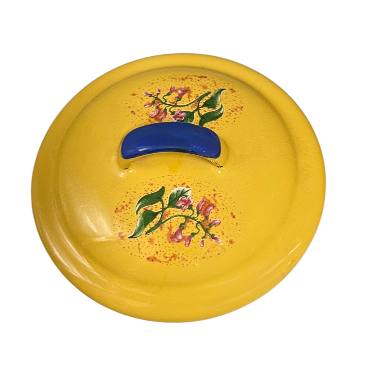 A round yellow enamel lid with a blue handle and hand-painted floral motifs, isolated on a white background.