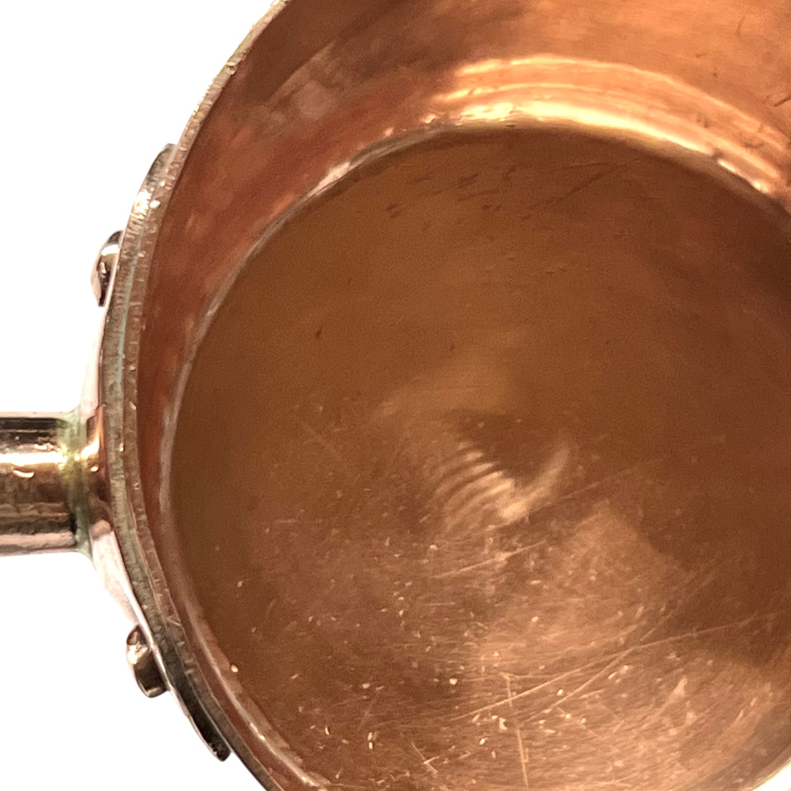 top rim of copper sugar pan