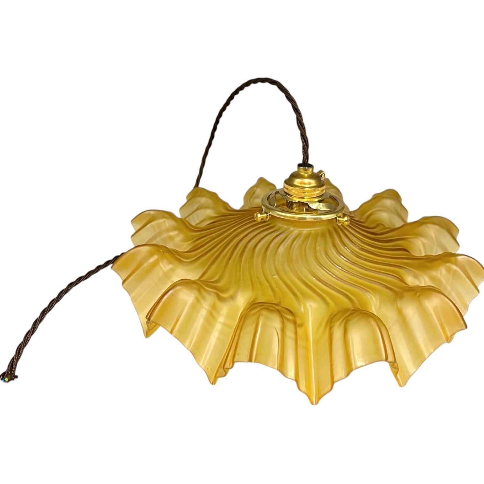 Amber coloured vintage French  pendant light with a scalloped design on a white background