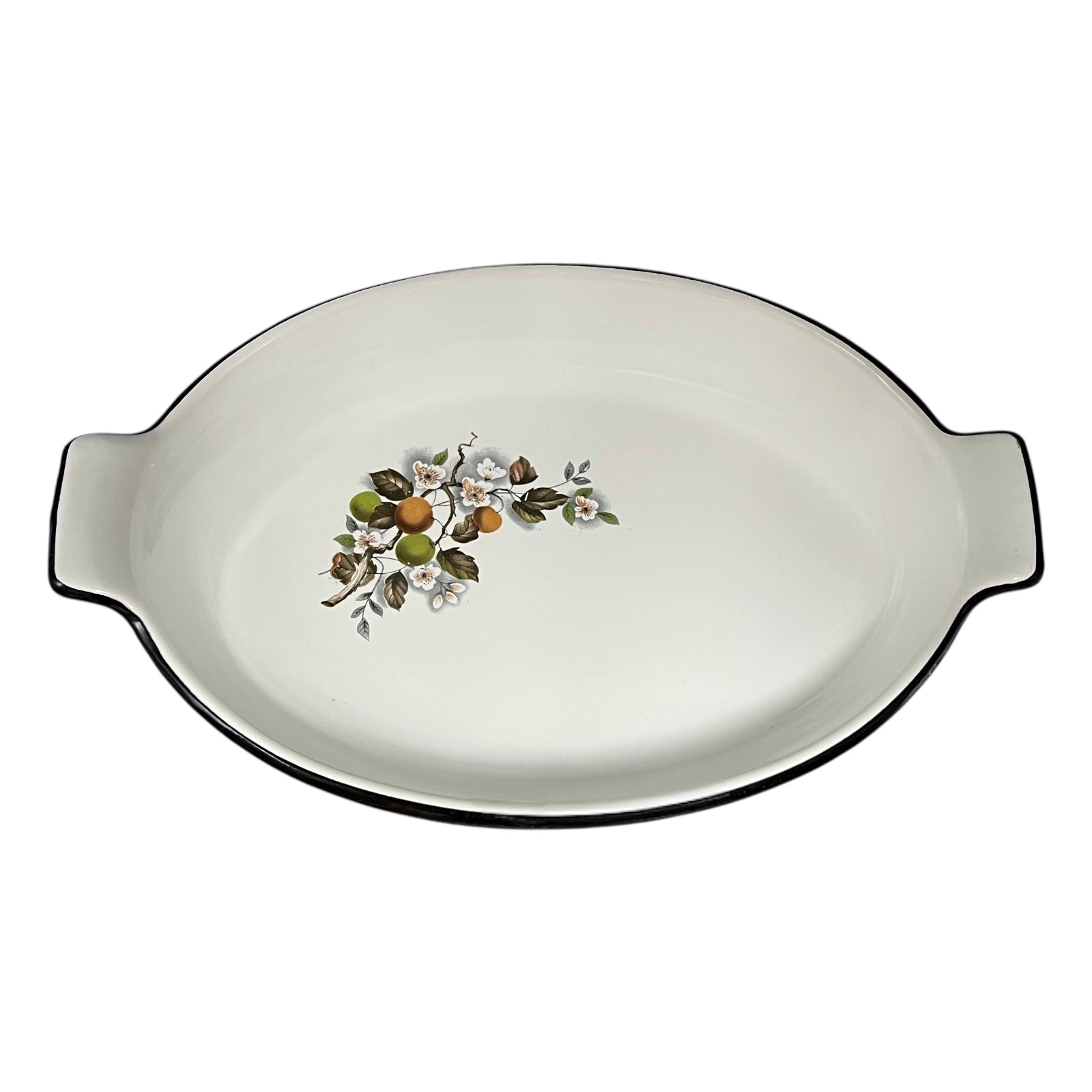 White enamel dish with floral design on a white background