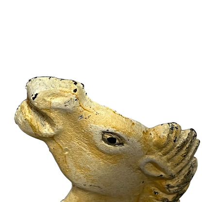 close up of a doorstop on a white background