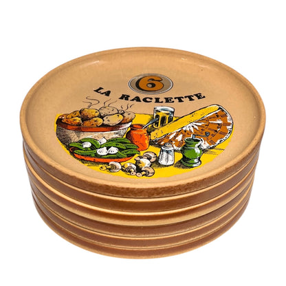 Set of plates with 'La Raclette' branding and illustrations on a white background
