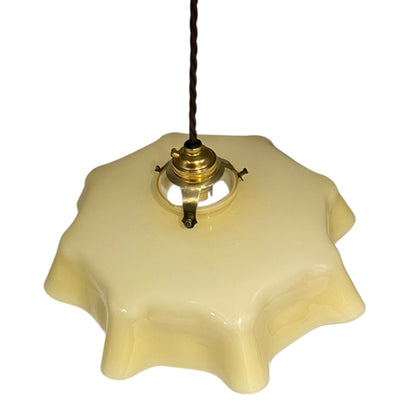 Vintage-style ceiling light fixture with dusk yellow glass shade on a white background 