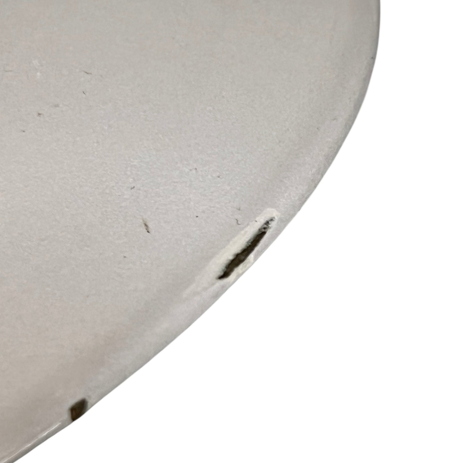 Close up of a Le Creuset pot on a white background