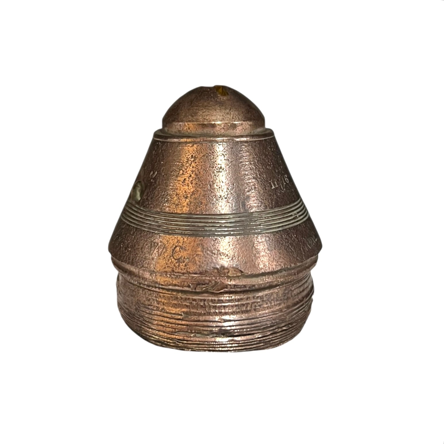Brass metal cap fuse on a white background