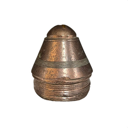 Brass metal cap fuse on a white background