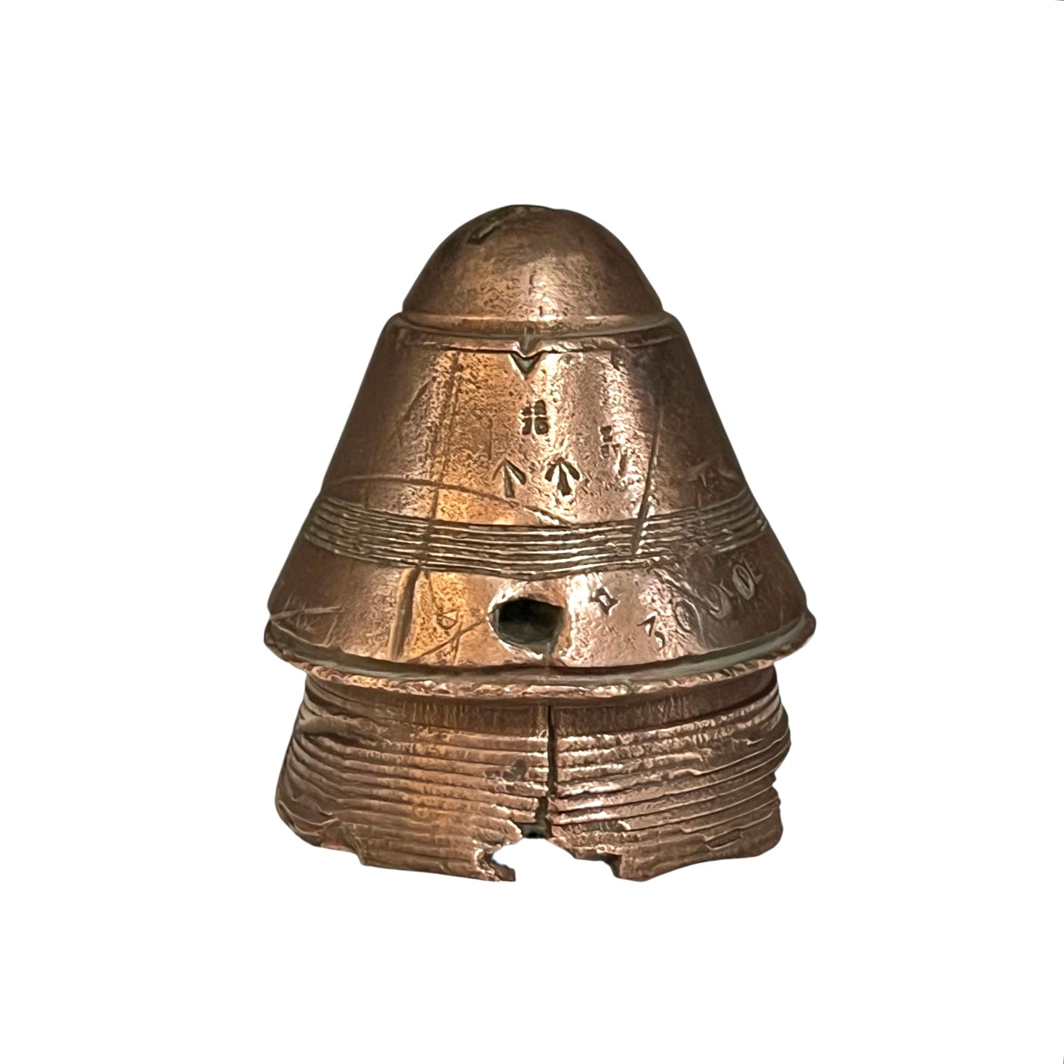 WW1 brass fuse paperweight on a white background 