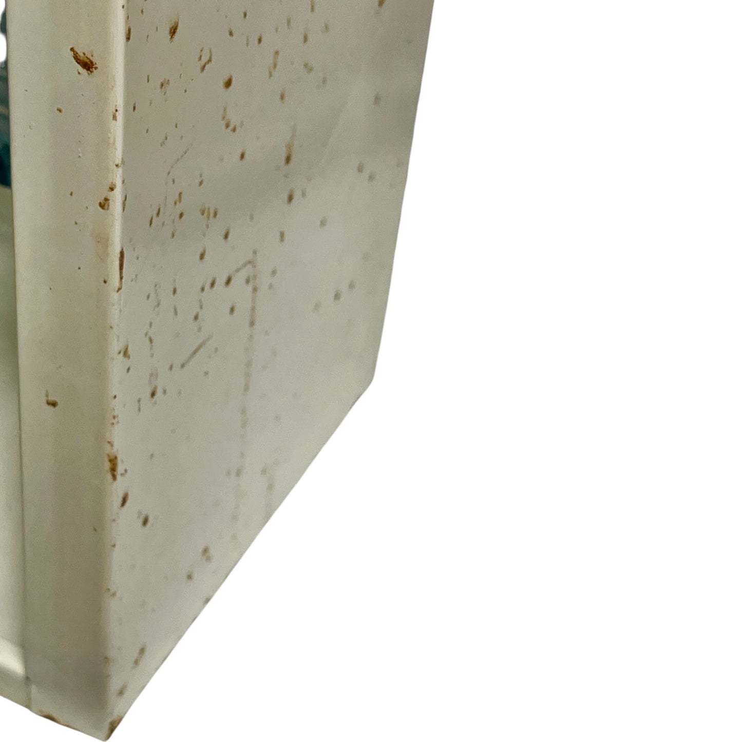 close up of a vintage metal bathroom cabinet