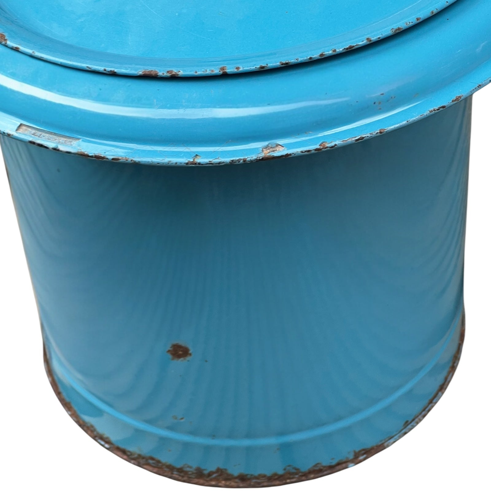 Blue metal bucket with a wooden handle on a white background