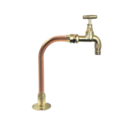 Brass and copper faucet on a white background