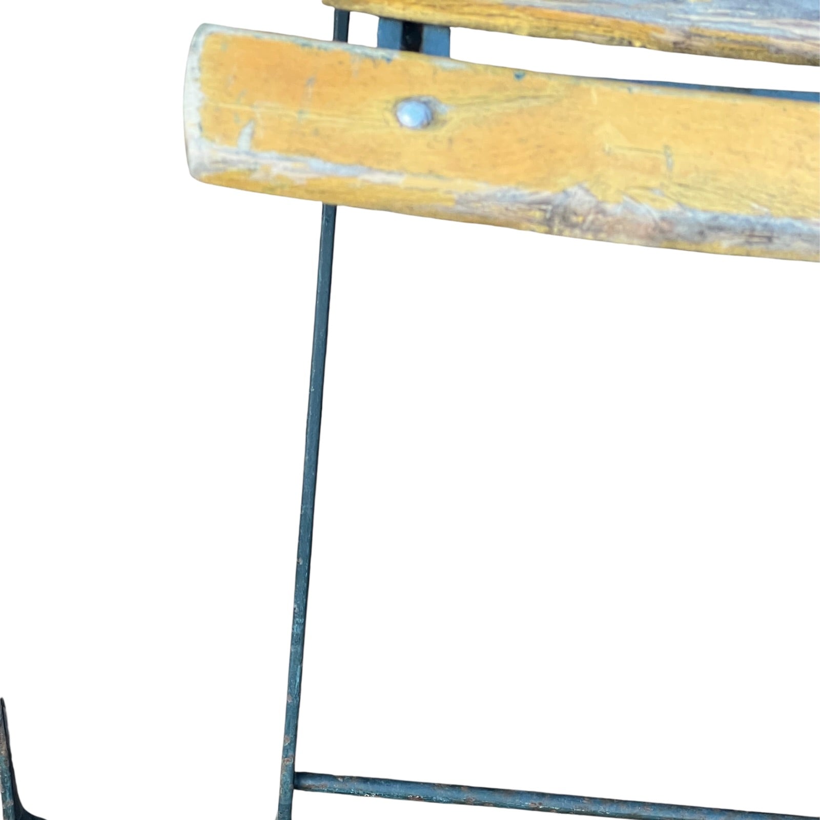 Close up of a wooden French folding chair on a white background 