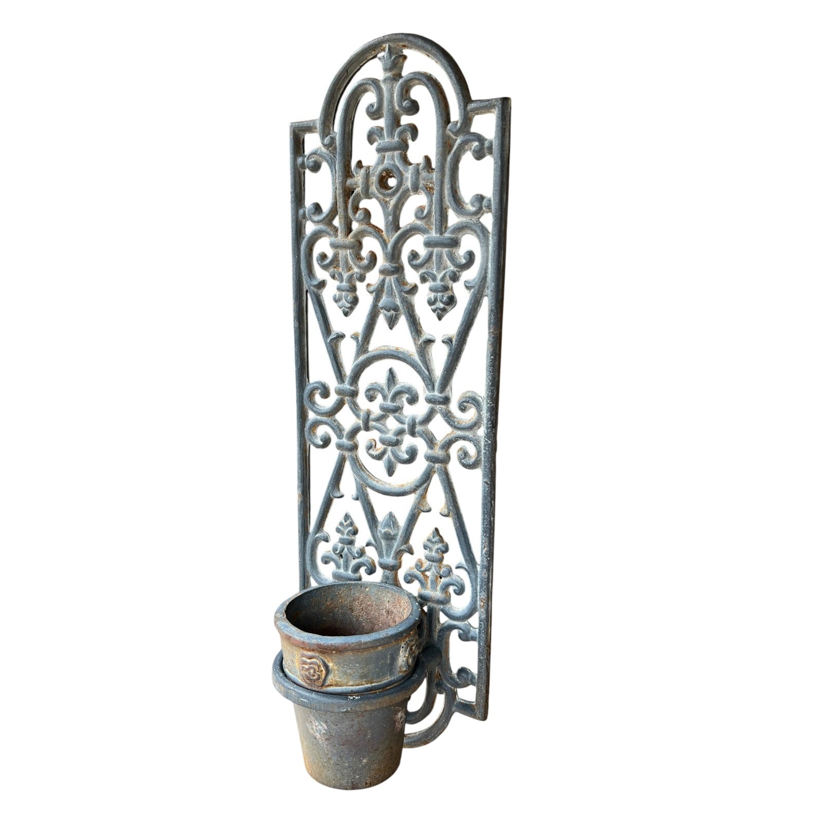 Decorative cast iron French vintage metal wall art with a planter pot on white background