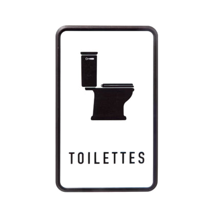 Black and white metal sign with a toilet icon and 'TOILETTES' text on a white background