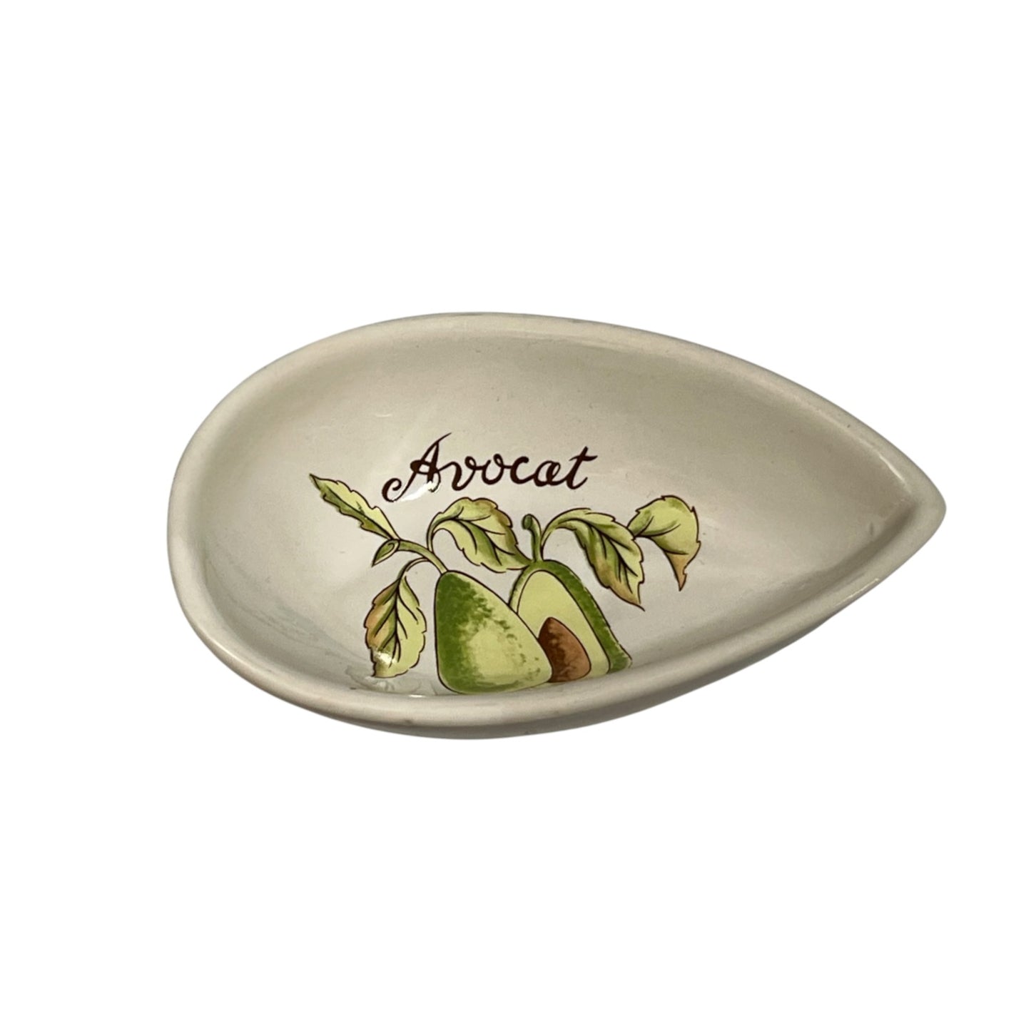 An oval ceramic dish with a teardrop-shaped end, featuring a painted avocado illustration and the word 'Avocat' in black script on a white background.
