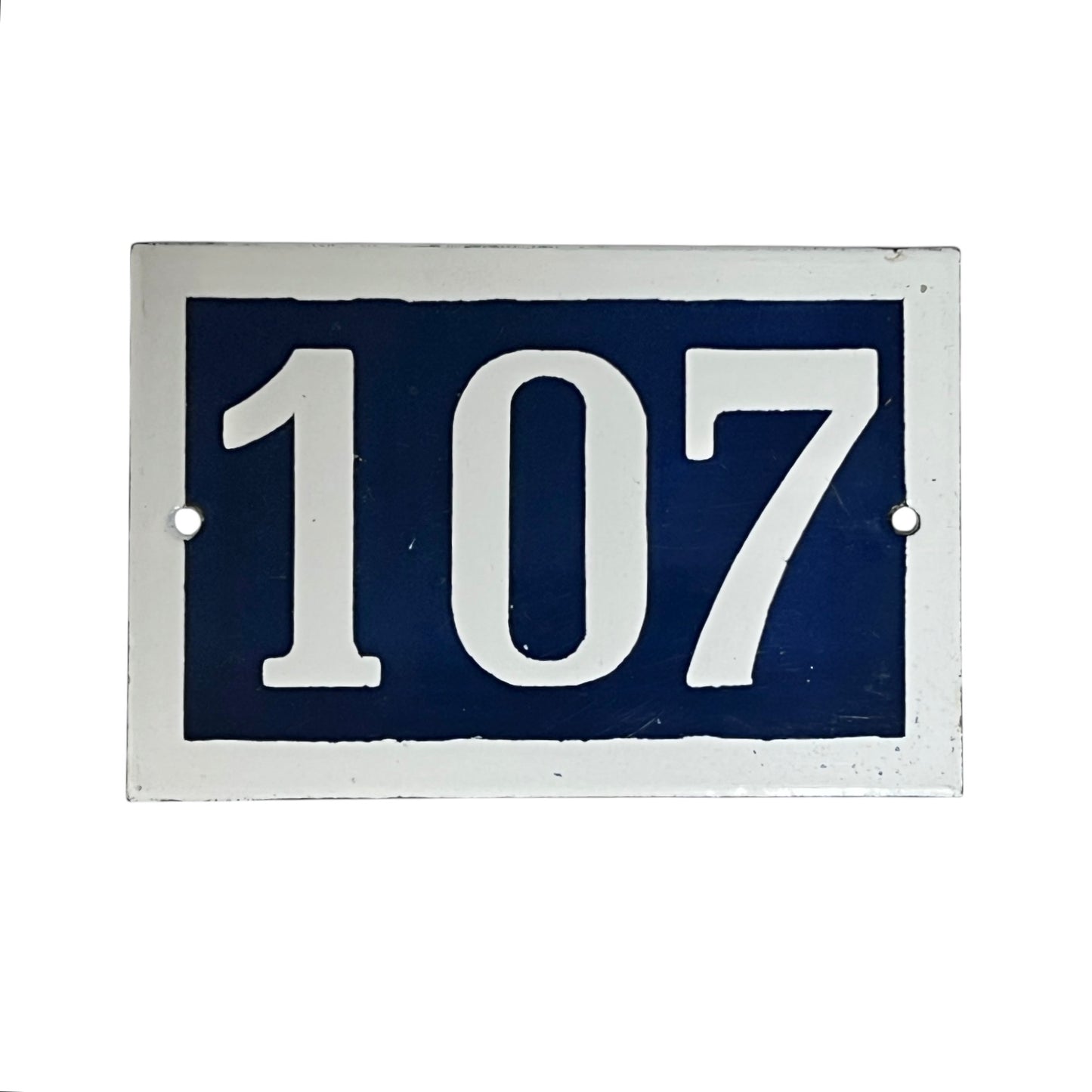 Navy blue rectangular plate with white numbers '107' on a white background