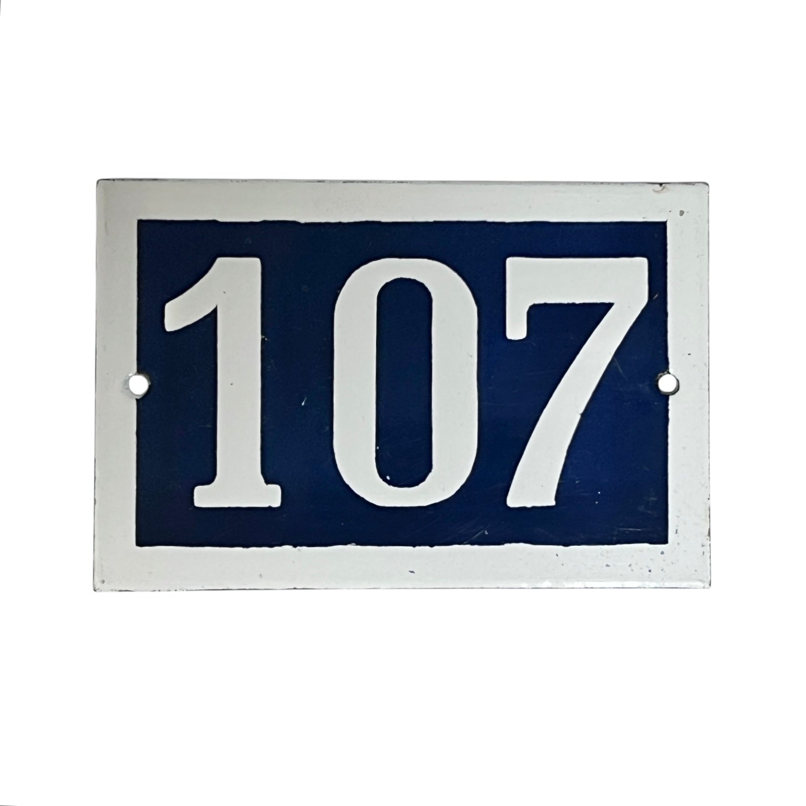 Navy blue rectangular plate with white numbers '107' on a white background
