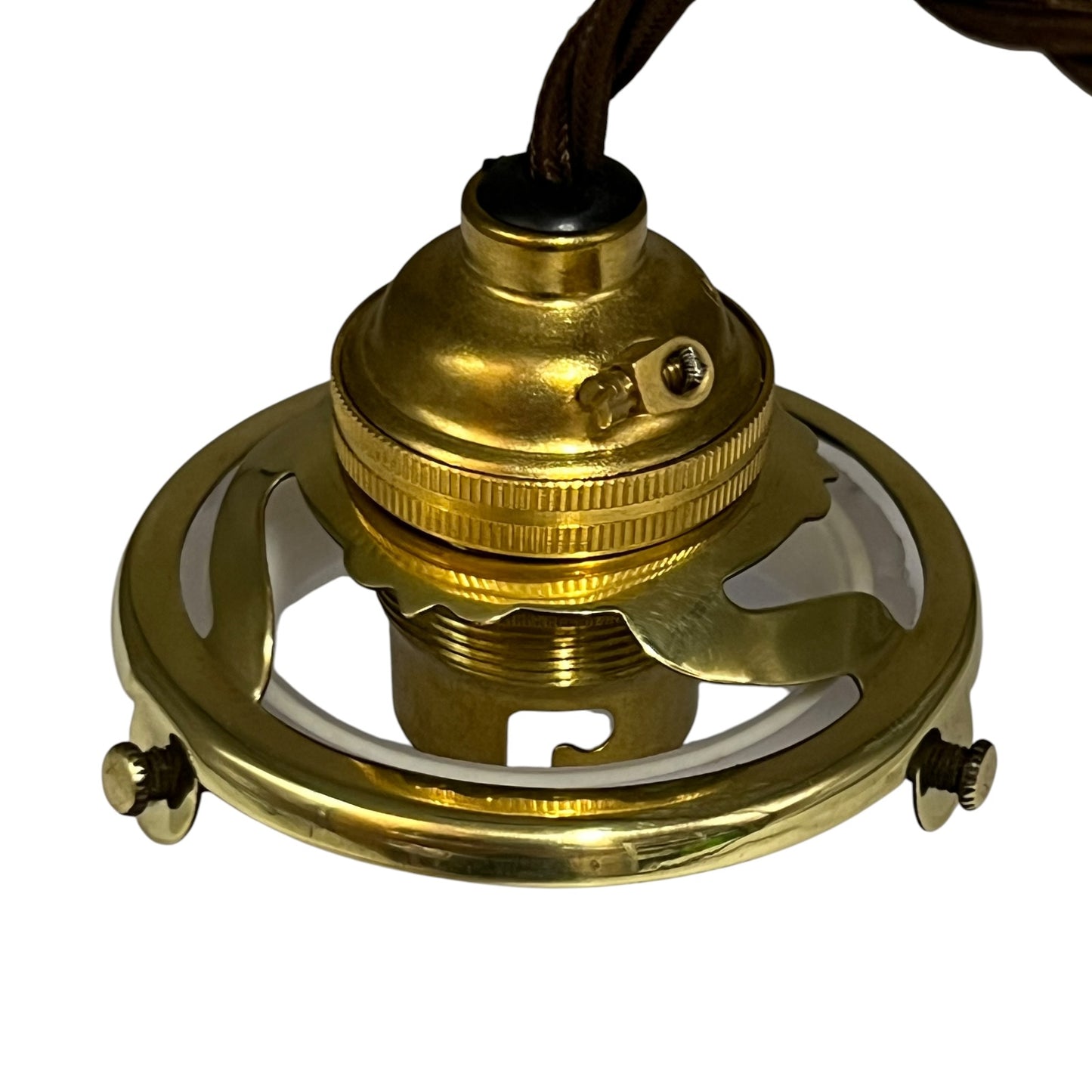A polished brass ceiling light socket with a circular metal frame and a dark brown hanging cord, shown against a plain white background.