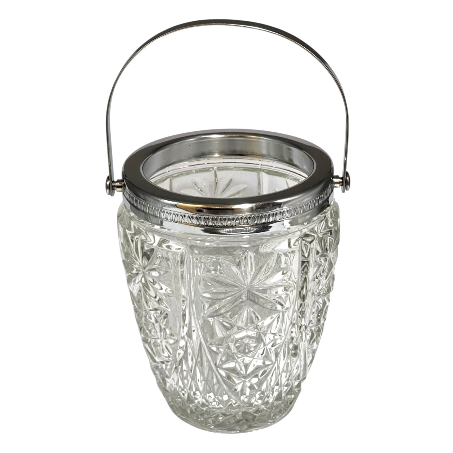 Decorative glass vintage ice bucket with metal collar and handle on a white background