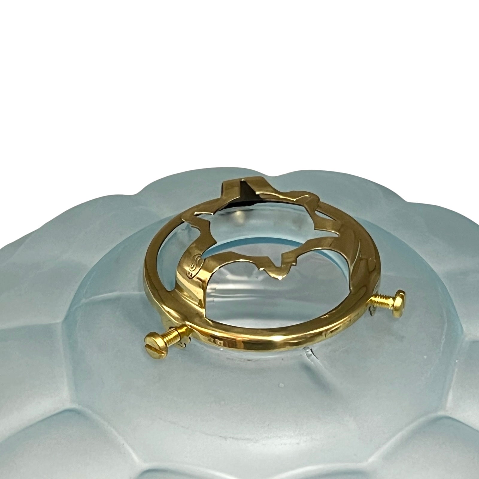 Angled view of the vintage French frosted pale blue glass pendant light shade with original brass gallery on a white background.