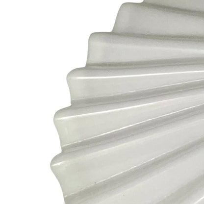 Close up of French glass lampshade on a white background