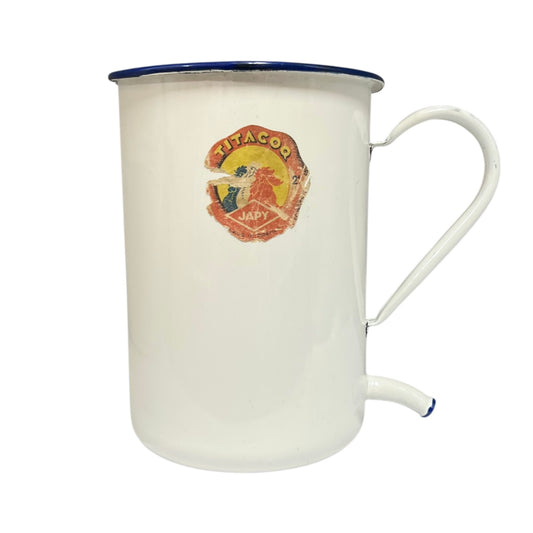 French vintage white and blue enamel jug with a pout and a makers sticker on a white background