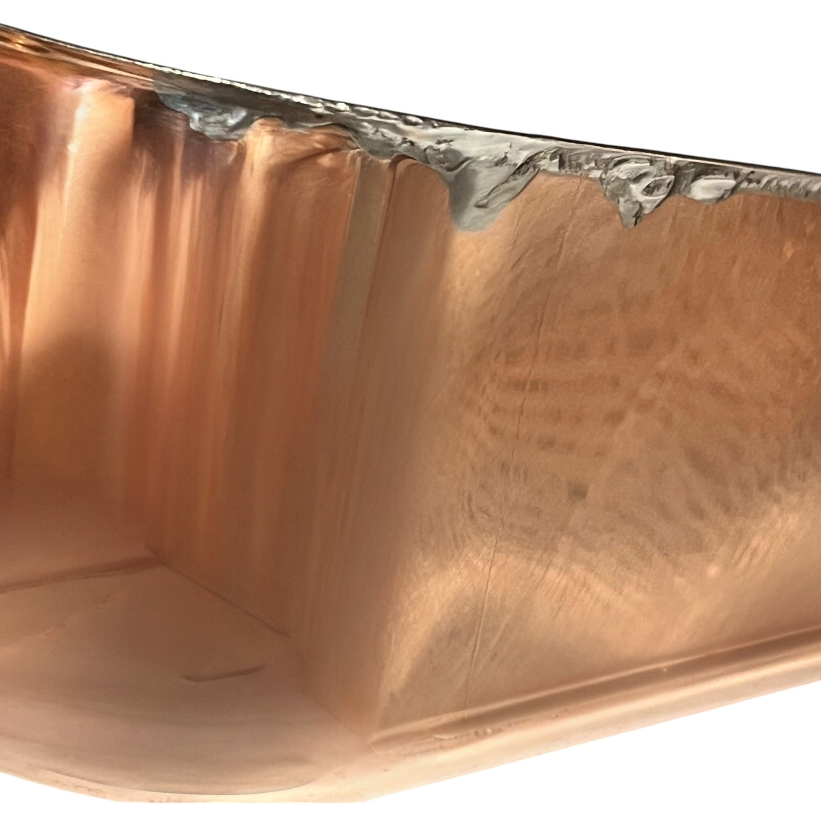 Copper roasting pan with tin lining on a white background
