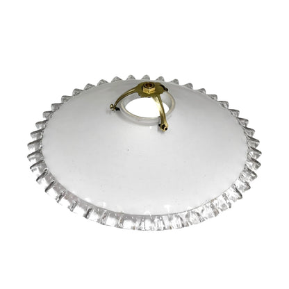 A round clear glass or acrylic ceiling light fixture with a scalloped edge and a central gold metal mounting ring, shown on a plain white background.