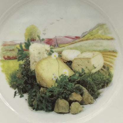 French cheese plate on a stand with a white background