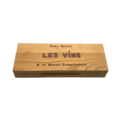 Wooden wine box with engraved text on a white background