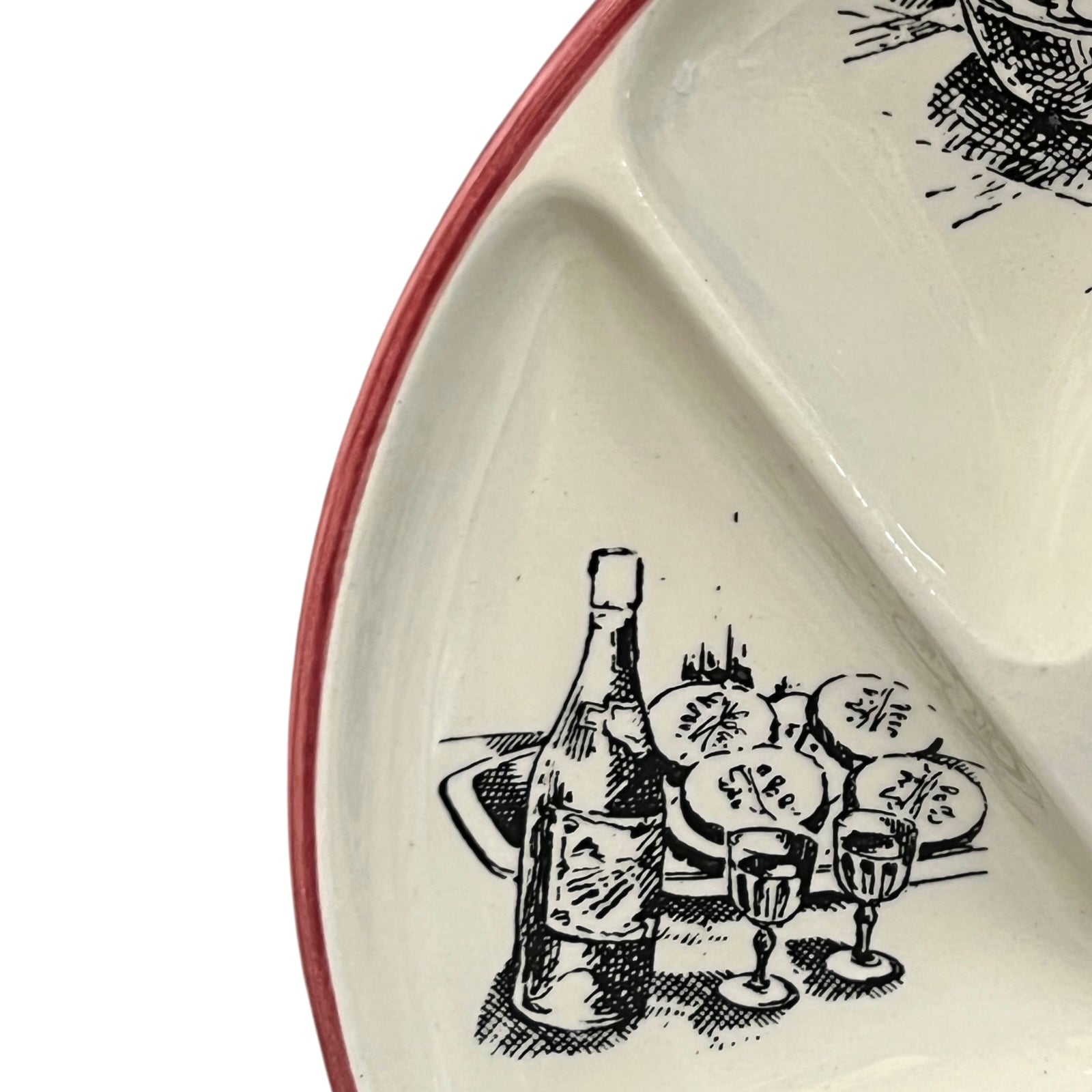 Close-up of a vintage fondue plate with detailed design on a white background