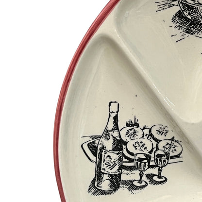 Close-up of a vintage fondue plate with detailed design on a white background