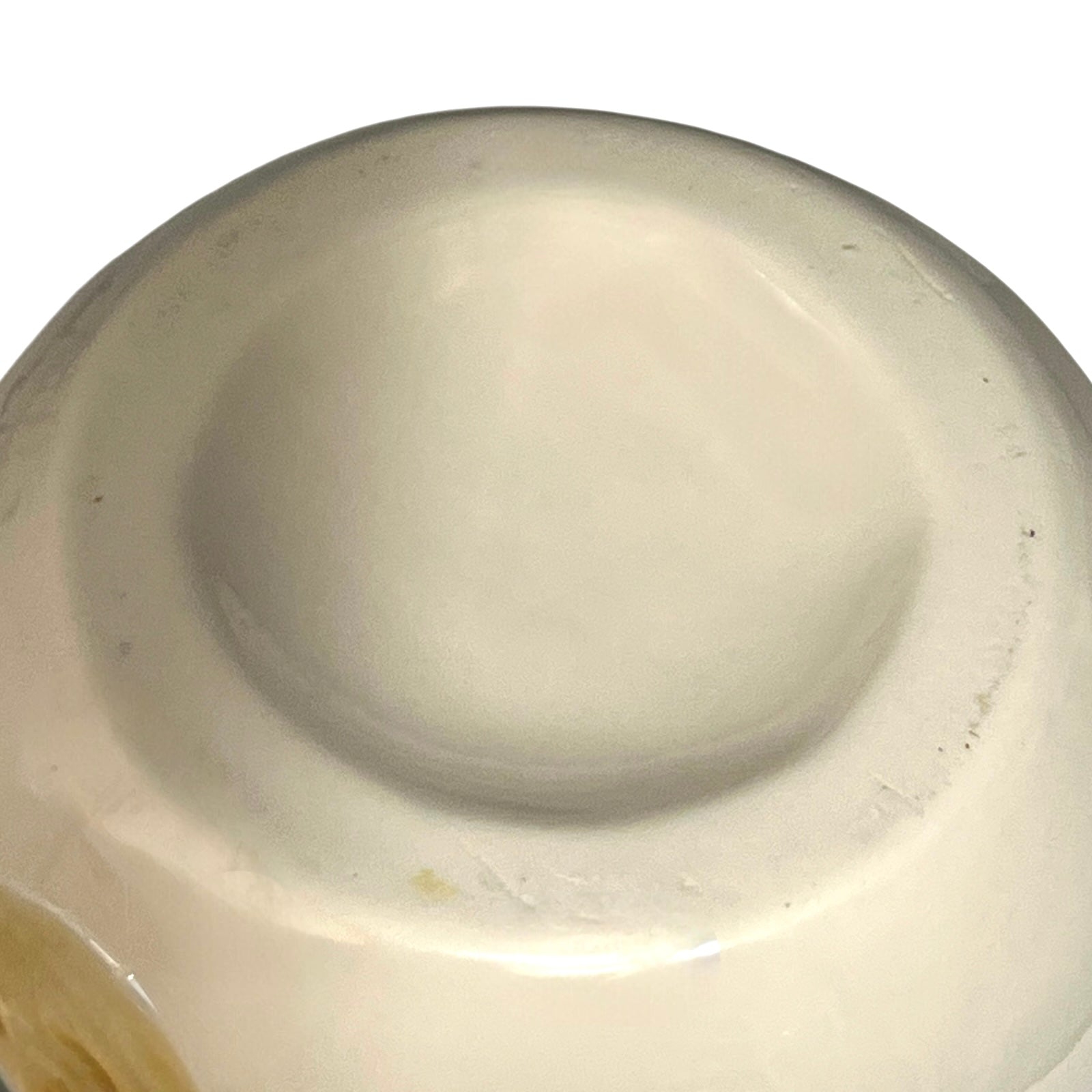 Close-up of a white ceramic jar base on a white background