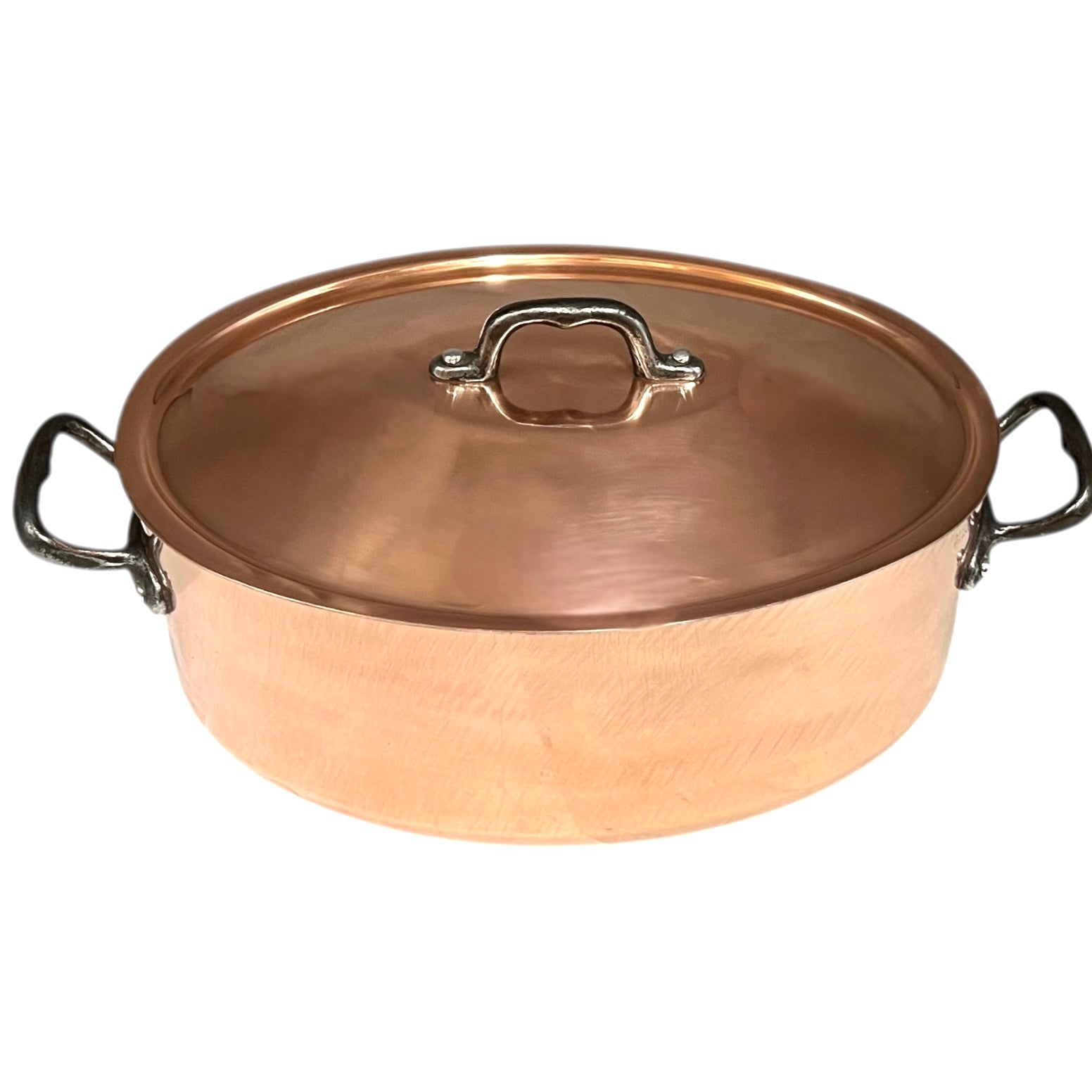 Copper pot with lid on a white background