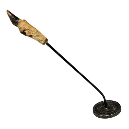 Decorative deer hoof handle salamander with a cast iron handle and base disc on a white background, ideal for a taxidermy collector