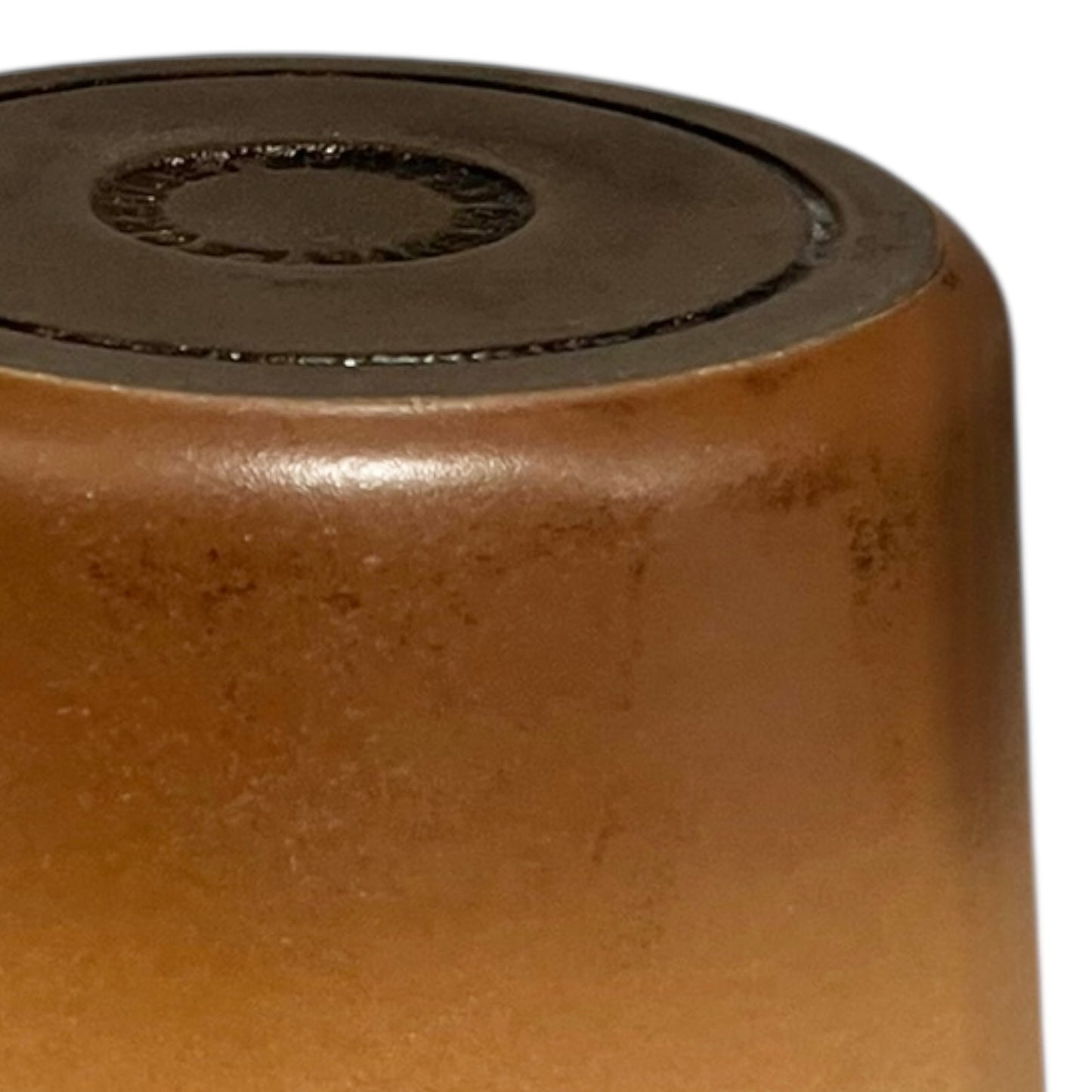 Close up of Le Creuset pan on a white background