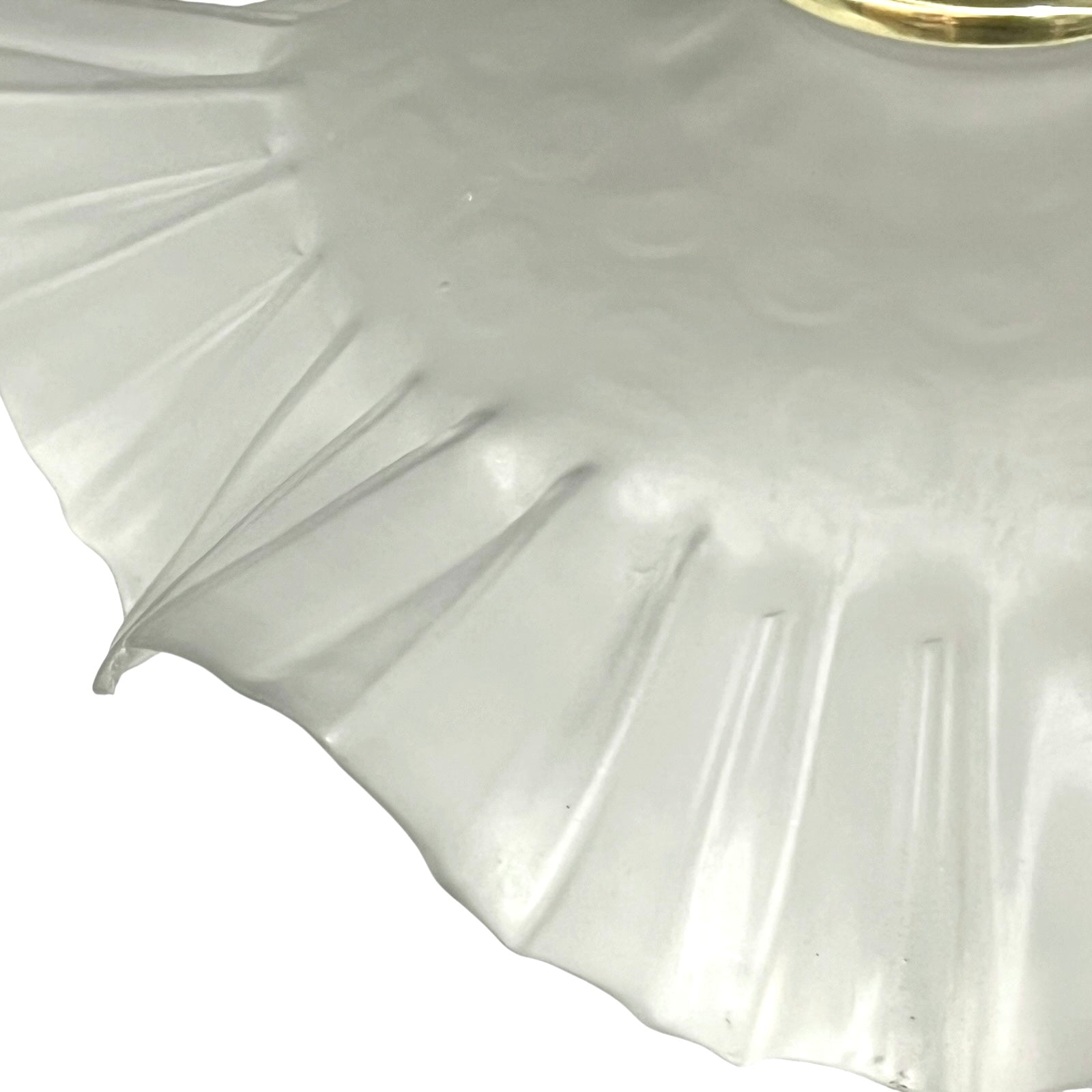 Close up of a French vintage frosted glass lampshade with a frilled scalloped style edge  on a white background