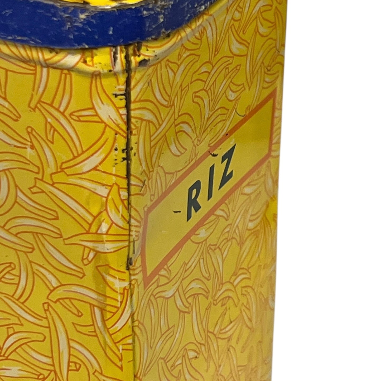 Close-up of a yellow container with 'Riz' branding on a white background