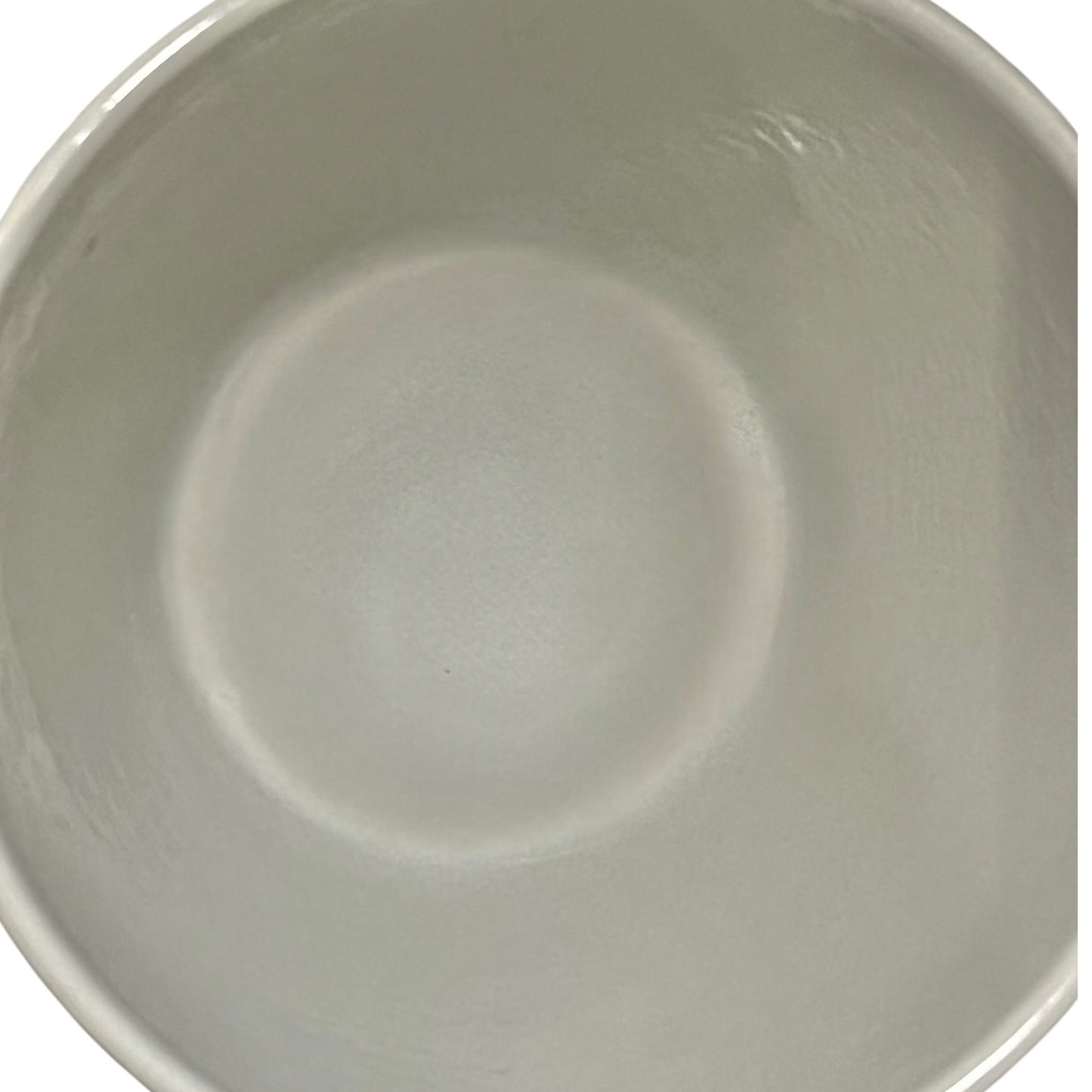 Close up of a fondue pan on a white background