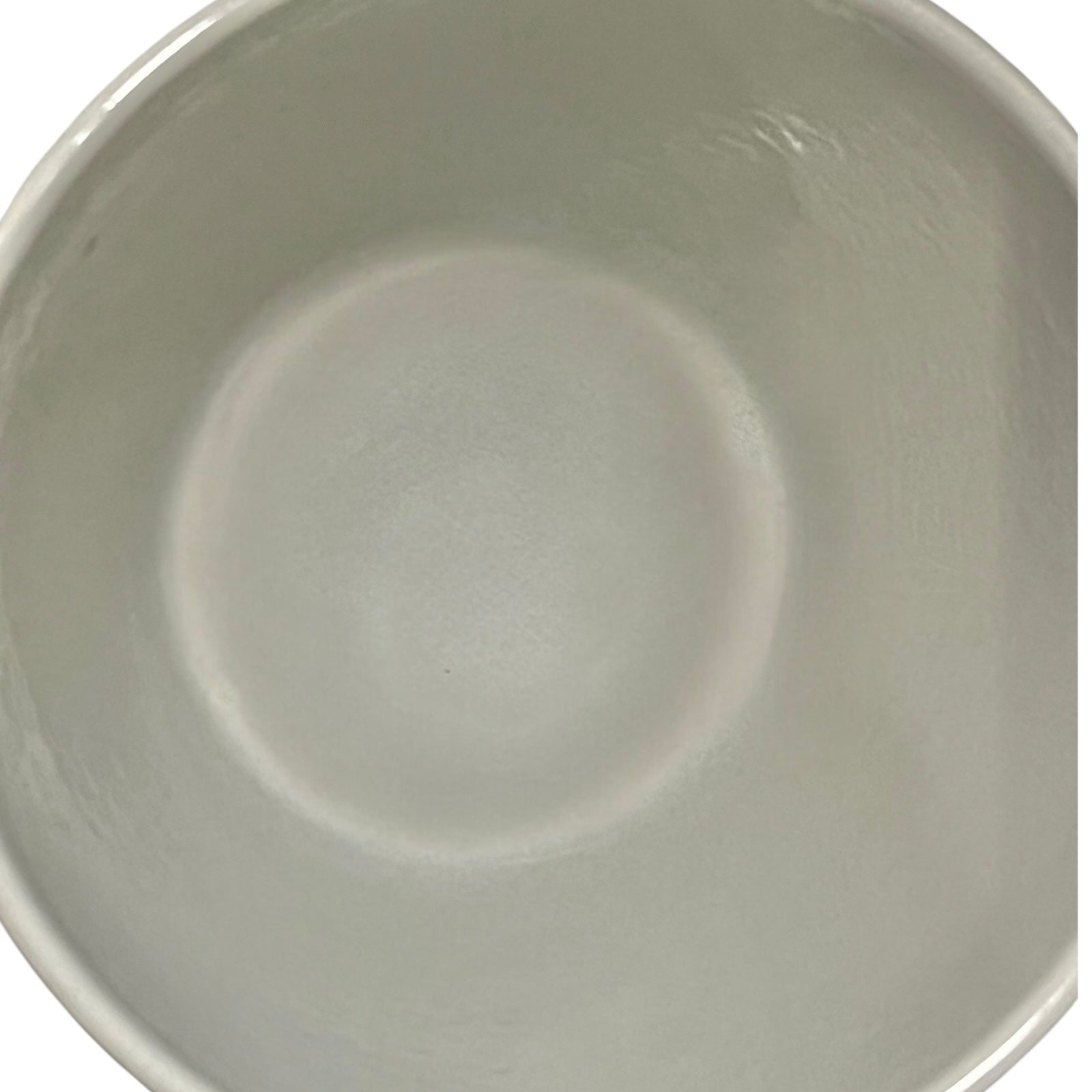Close up of a fondue pan on a white background