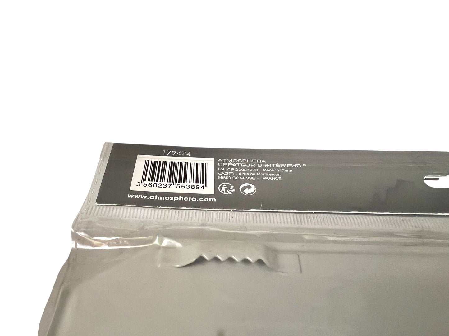 Back view of a  product with a label on a white background
