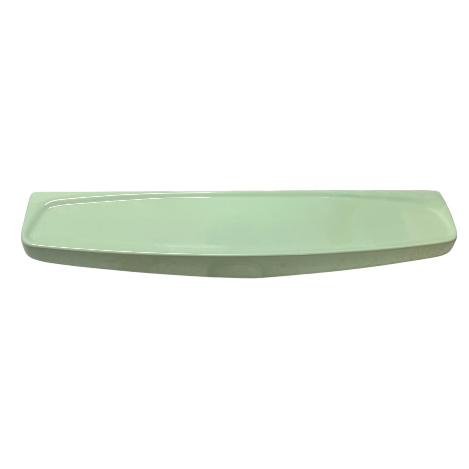 Pale green ceramic shelf on a white background
