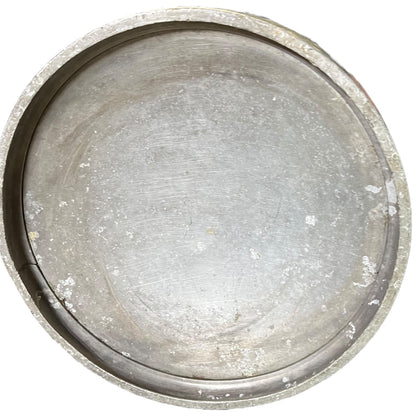 Close-up of a grey milk churn on a white background