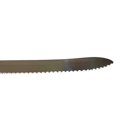 A close-up of a serrated metal knife blade on a plain white background.