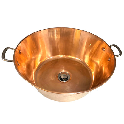Copper sink with handles on a white background