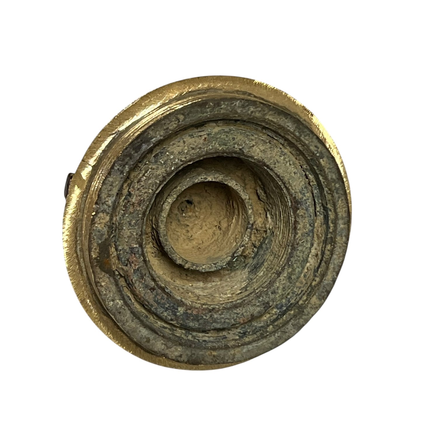 Close up of a British WW1 brass fuse  on a white background 
